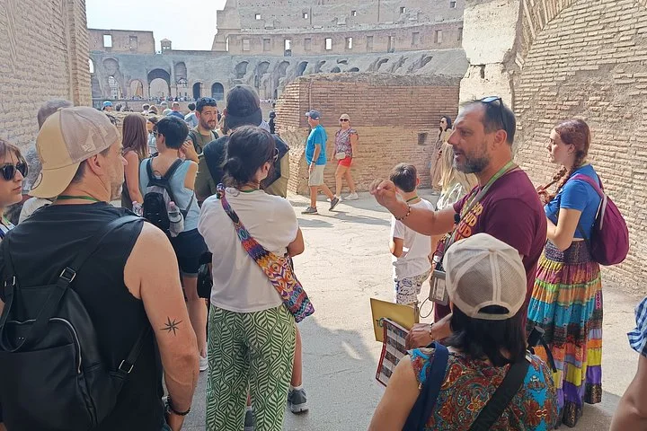 A guide showing an illustration in the Colosseum